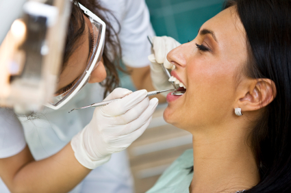 doctor performing dental exam